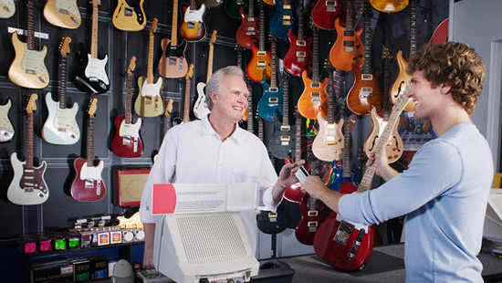 Small business owner making a sale